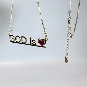 God is Love inspirational necklace. 18k gold plated. 18in box chain 2in extender